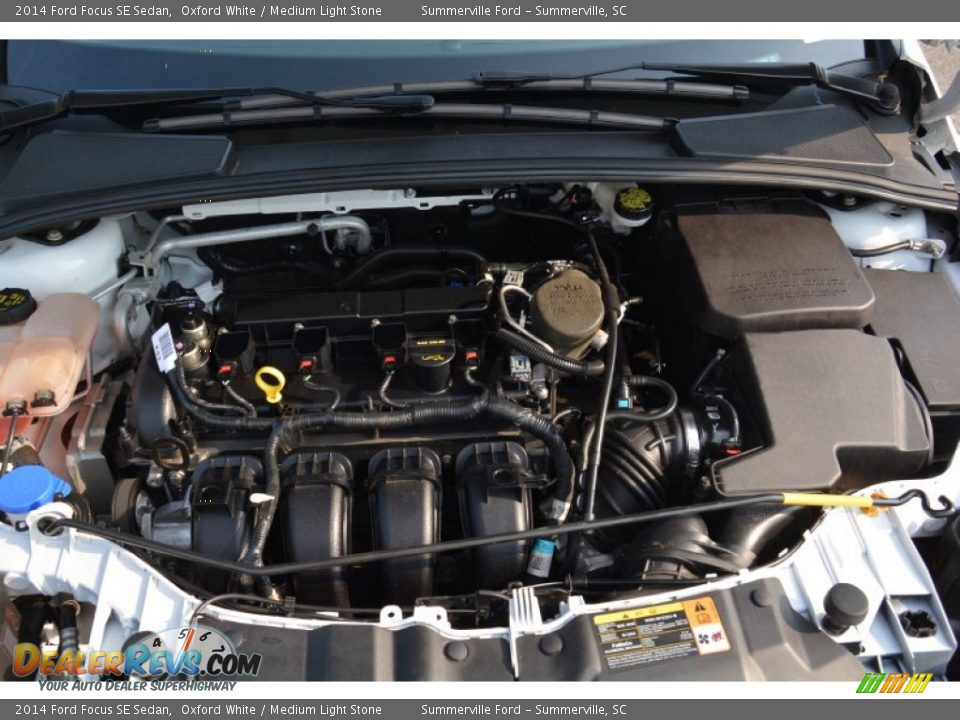 2014 Ford Focus SE Sedan Oxford White / Medium Light Stone Photo #23