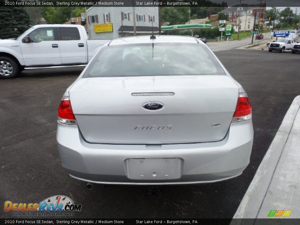 2010 Ford Focus SE Sedan Sterling Grey Metallic / Medium Stone Photo #4