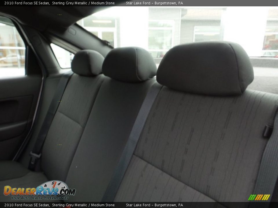 2010 Ford Focus SE Sedan Sterling Grey Metallic / Medium Stone Photo #11