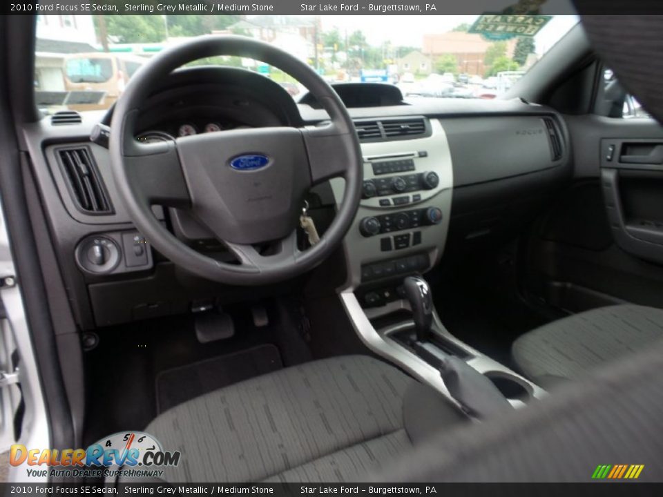 2010 Ford Focus SE Sedan Sterling Grey Metallic / Medium Stone Photo #12