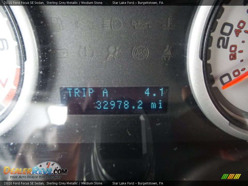 2010 Ford Focus SE Sedan Sterling Grey Metallic / Medium Stone Photo #19