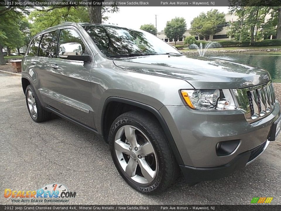 Front 3/4 View of 2012 Jeep Grand Cherokee Overland 4x4 Photo #8