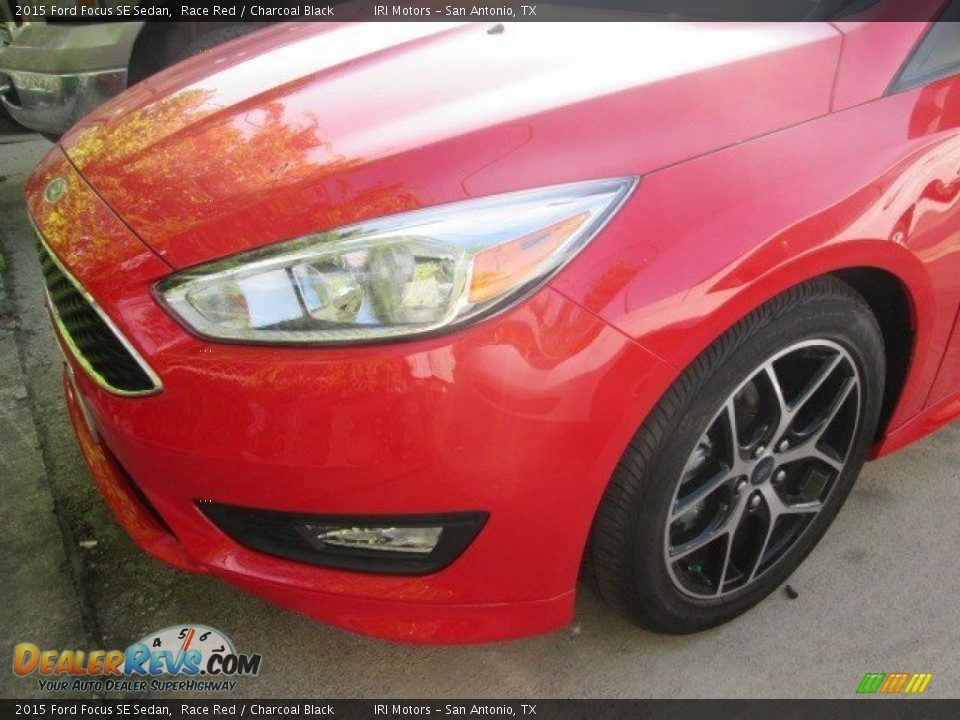 2015 Ford Focus SE Sedan Race Red / Charcoal Black Photo #5