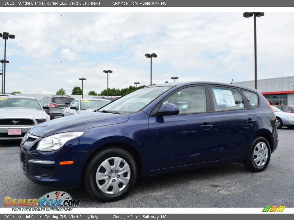 Front 3/4 View of 2011 Hyundai Elantra Touring GLS Photo #7