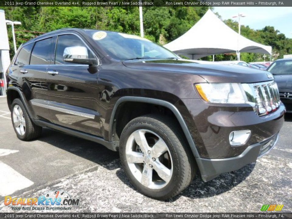 Front 3/4 View of 2011 Jeep Grand Cherokee Overland 4x4 Photo #6