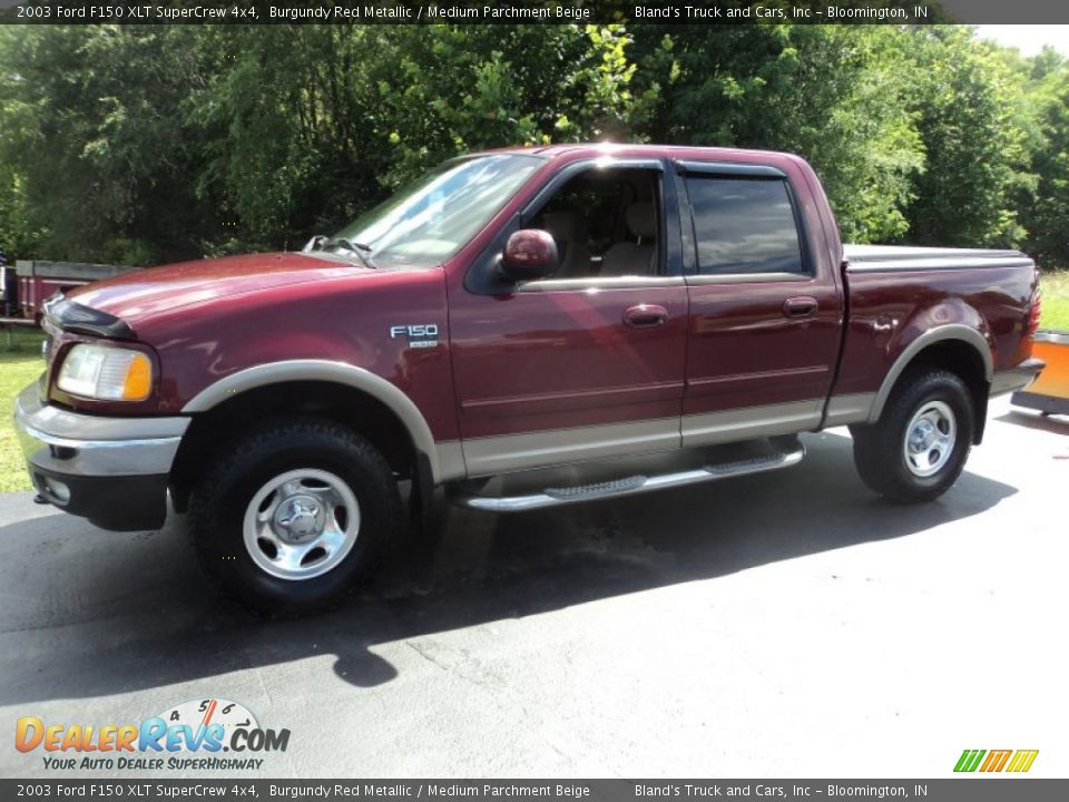 Front 3/4 View of 2003 Ford F150 XLT SuperCrew 4x4 Photo #1