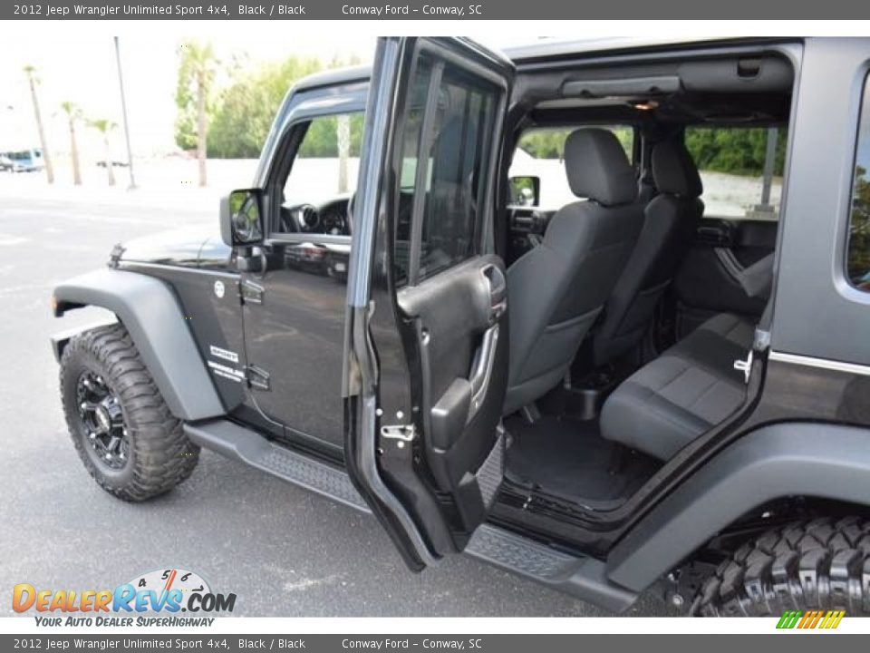 2012 Jeep Wrangler Unlimited Sport 4x4 Black / Black Photo #12