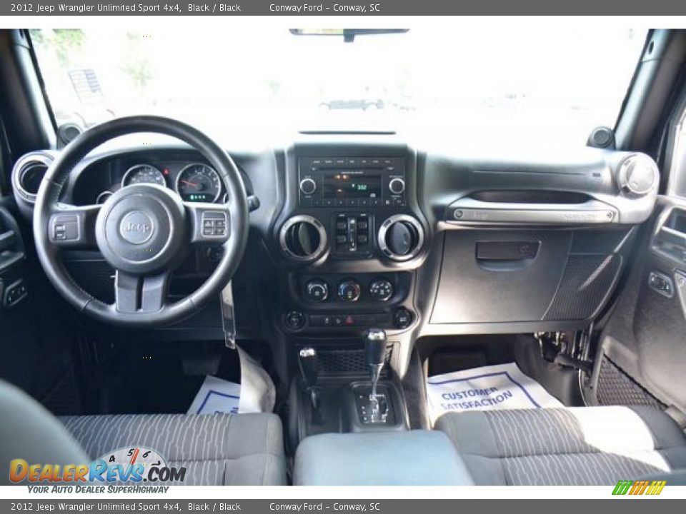2012 Jeep Wrangler Unlimited Sport 4x4 Black / Black Photo #16