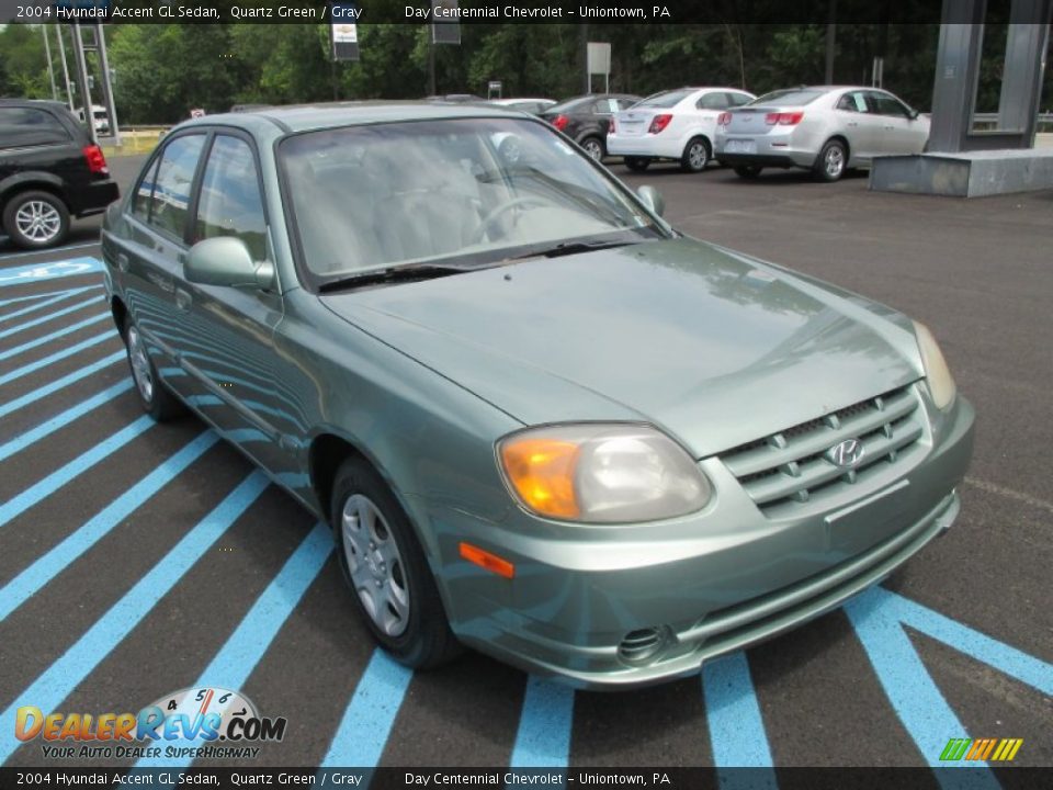 Front 3/4 View of 2004 Hyundai Accent GL Sedan Photo #12