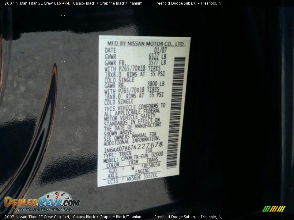 2007 Nissan Titan SE Crew Cab 4x4 Galaxy Black / Graphite Black/Titanium Photo #33