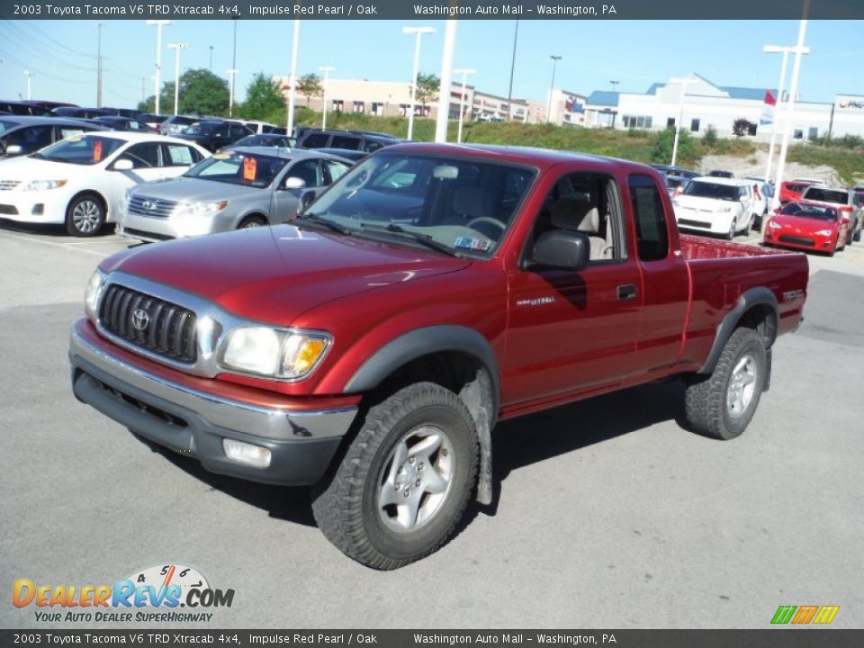 Front 3/4 View of 2003 Toyota Tacoma V6 TRD Xtracab 4x4 Photo #4