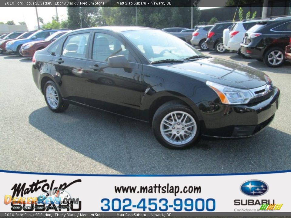 2010 Ford Focus SE Sedan Ebony Black / Medium Stone Photo #1