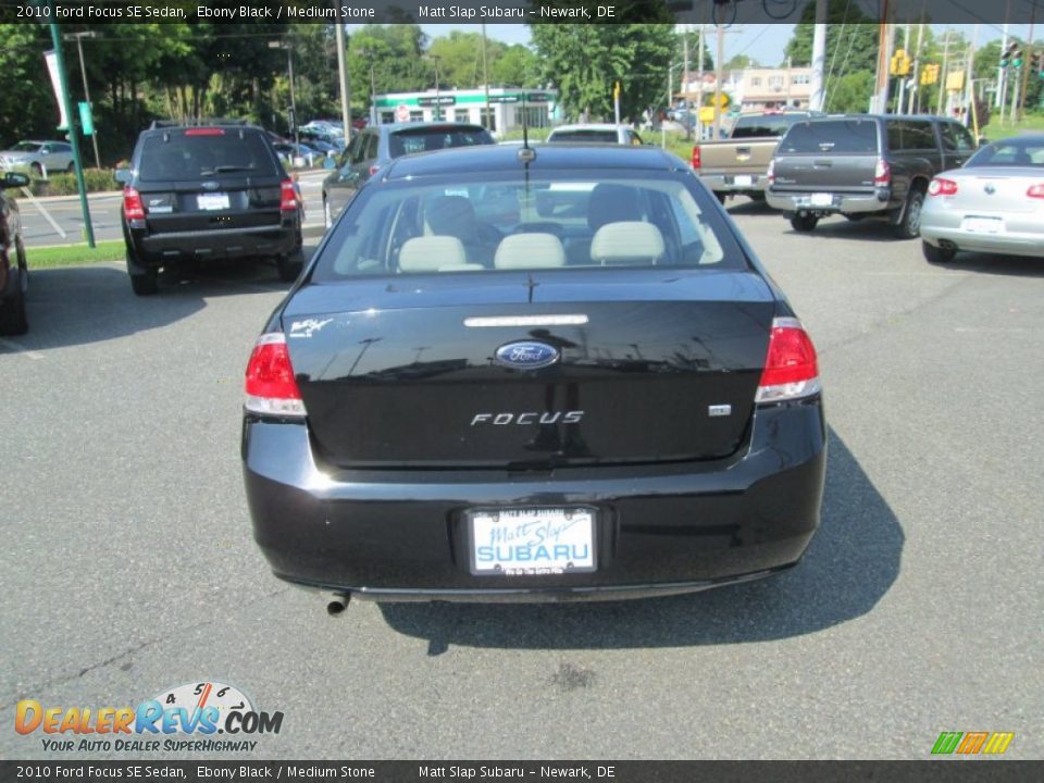 2010 Ford Focus SE Sedan Ebony Black / Medium Stone Photo #7