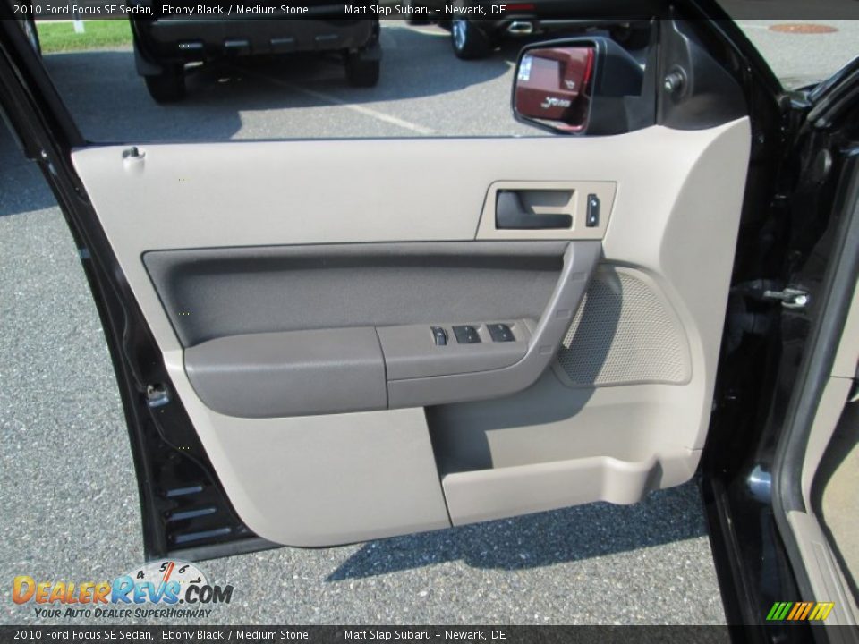2010 Ford Focus SE Sedan Ebony Black / Medium Stone Photo #12