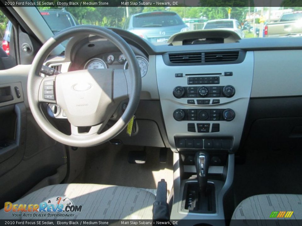 2010 Ford Focus SE Sedan Ebony Black / Medium Stone Photo #16