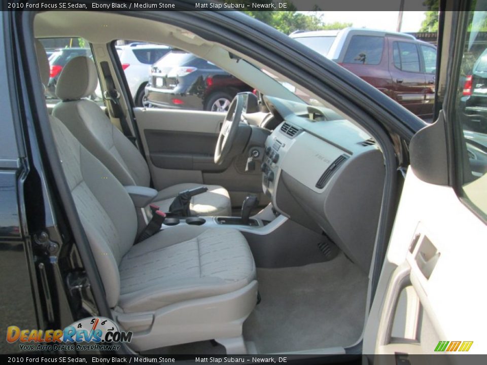 2010 Ford Focus SE Sedan Ebony Black / Medium Stone Photo #17