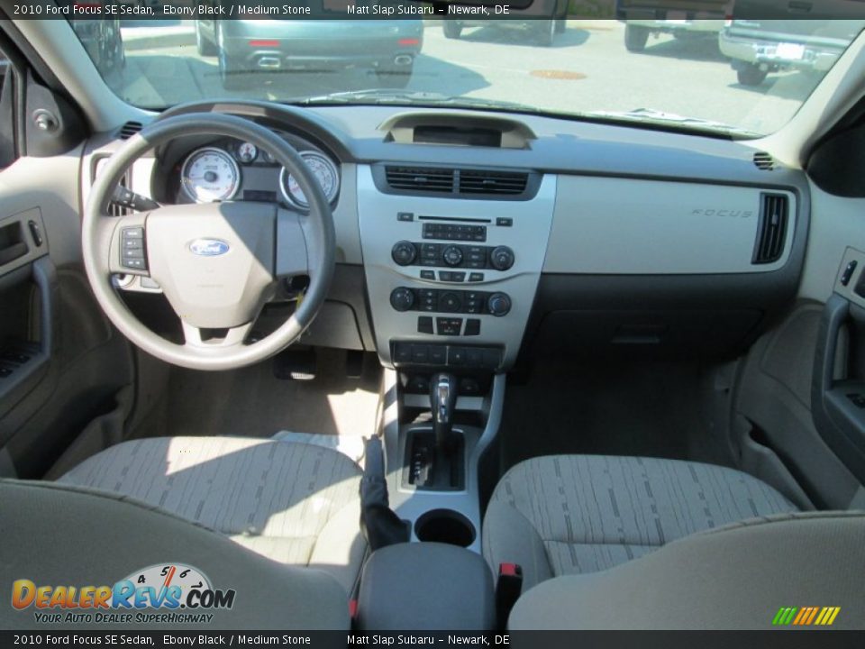 2010 Ford Focus SE Sedan Ebony Black / Medium Stone Photo #23