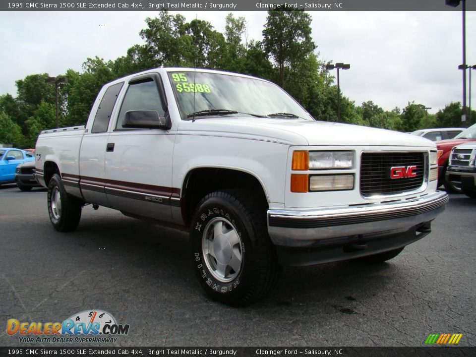 1995 GMC Sierra 1500 SLE Extended Cab 4x4 Bright Teal Metallic / Burgundy Photo #1