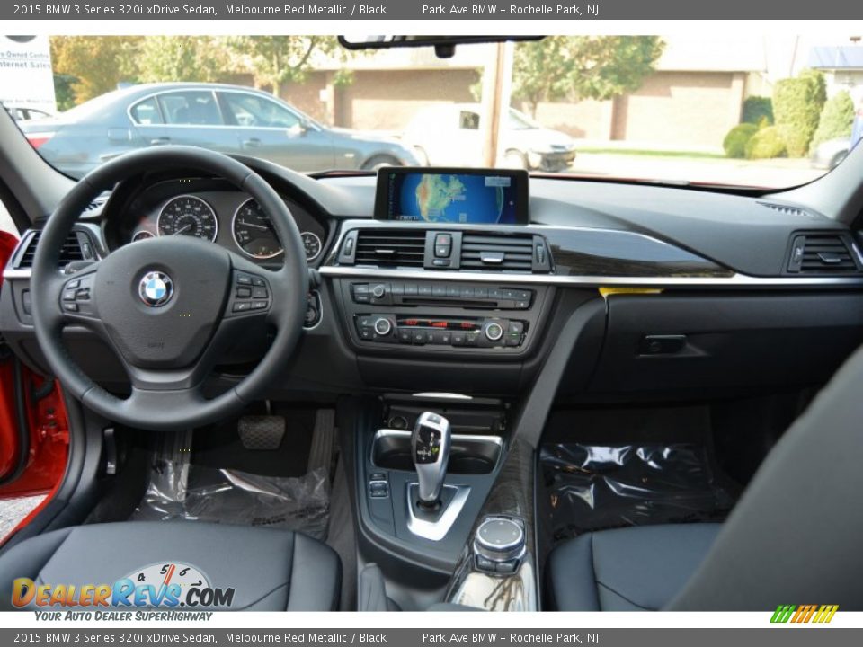 Dashboard of 2015 BMW 3 Series 320i xDrive Sedan Photo #13
