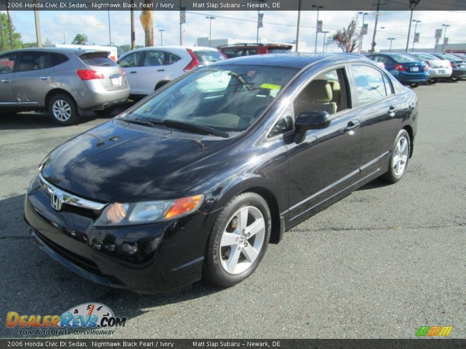 Front 3/4 View of 2006 Honda Civic EX Sedan Photo #2
