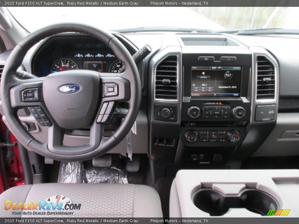 2015 Ford F150 XLT SuperCrew Ruby Red Metallic / Medium Earth Gray Photo #24