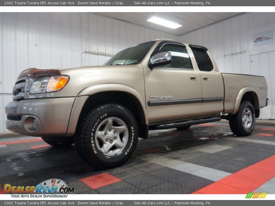 Front 3/4 View of 2003 Toyota Tundra SR5 Access Cab 4x4 Photo #2