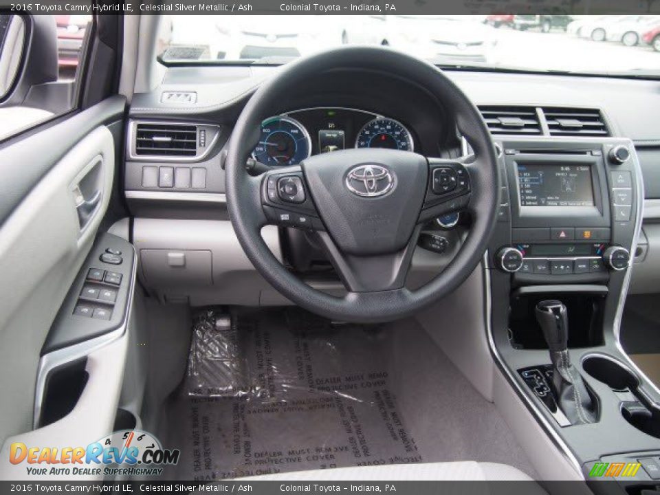 Dashboard of 2016 Toyota Camry Hybrid LE Photo #6