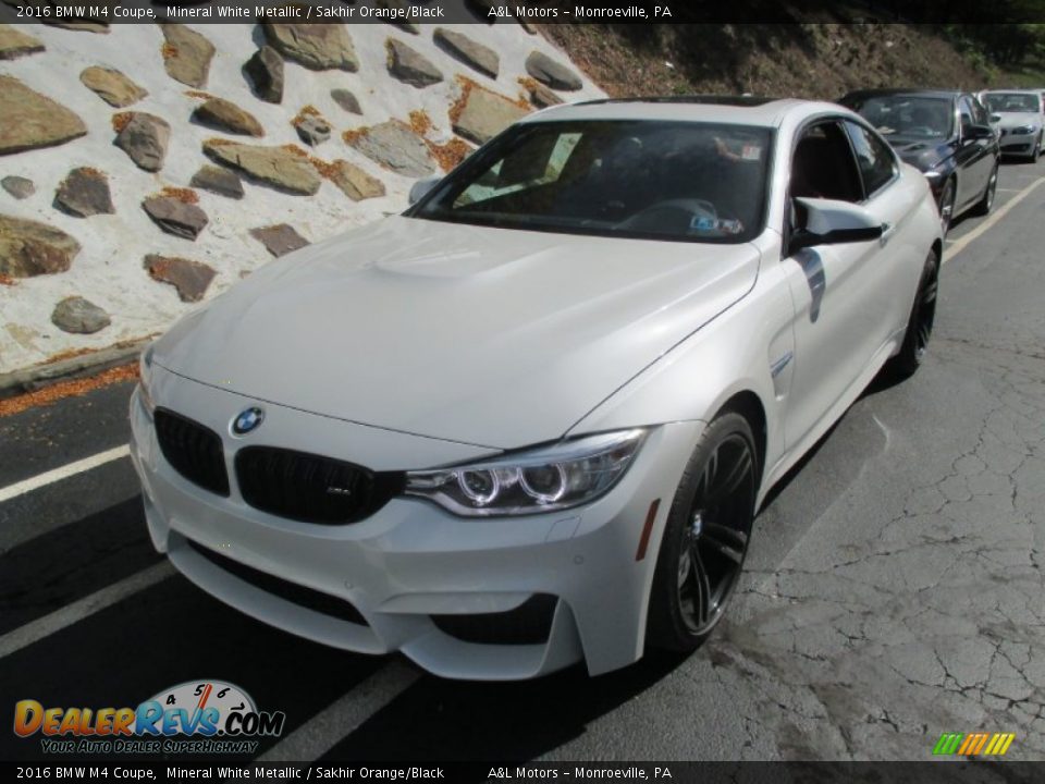 Front 3/4 View of 2016 BMW M4 Coupe Photo #9