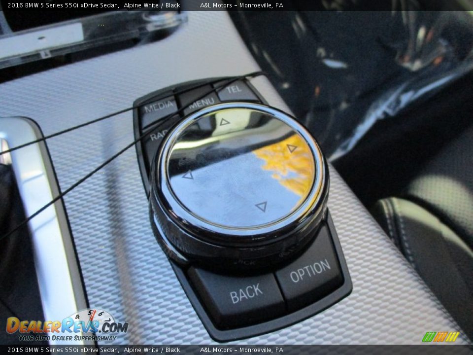 Controls of 2016 BMW 5 Series 550i xDrive Sedan Photo #17