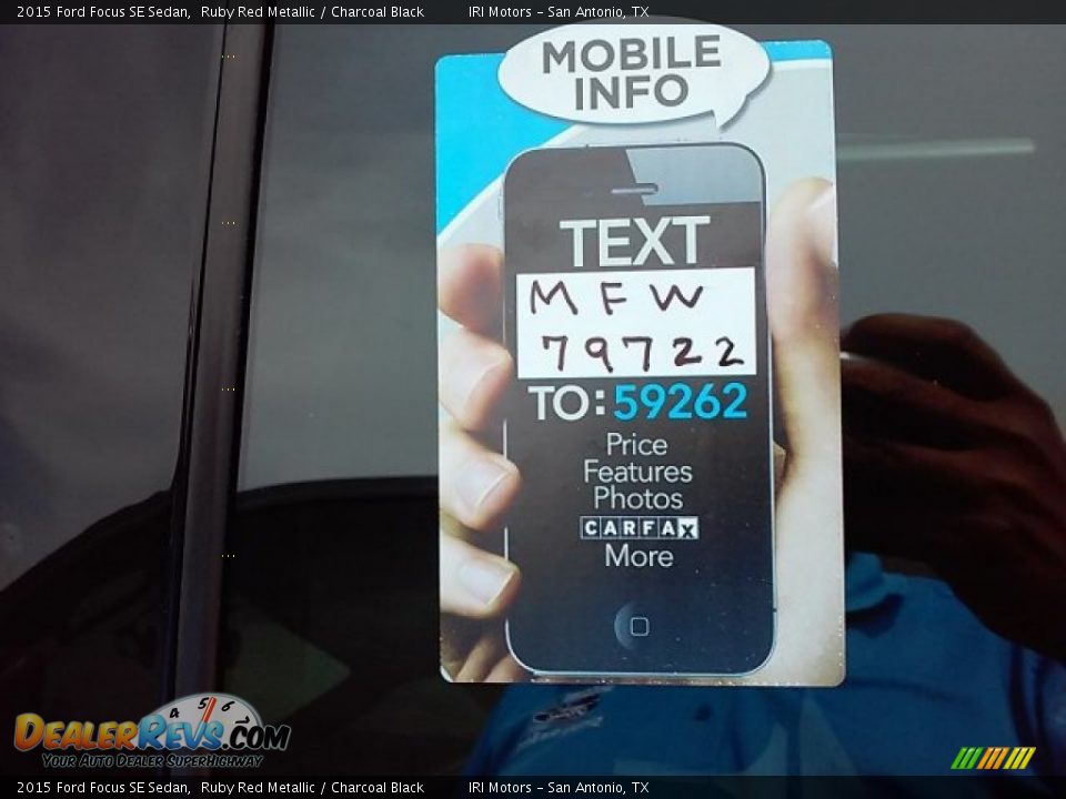 2015 Ford Focus SE Sedan Ruby Red Metallic / Charcoal Black Photo #33