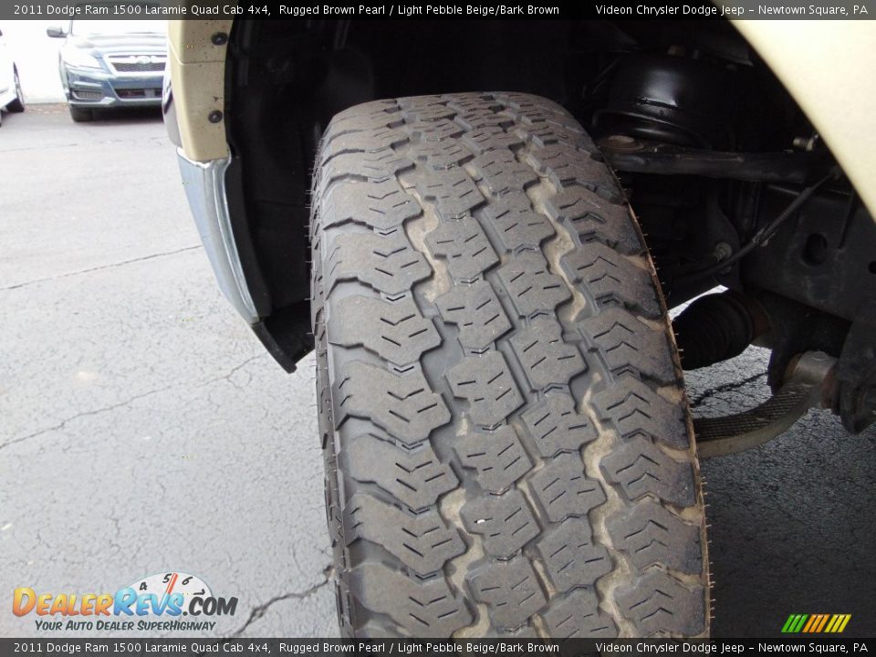 2011 Dodge Ram 1500 Laramie Quad Cab 4x4 Rugged Brown Pearl / Light Pebble Beige/Bark Brown Photo #13