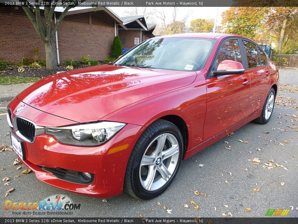Front 3/4 View of 2013 BMW 3 Series 328i xDrive Sedan Photo #1