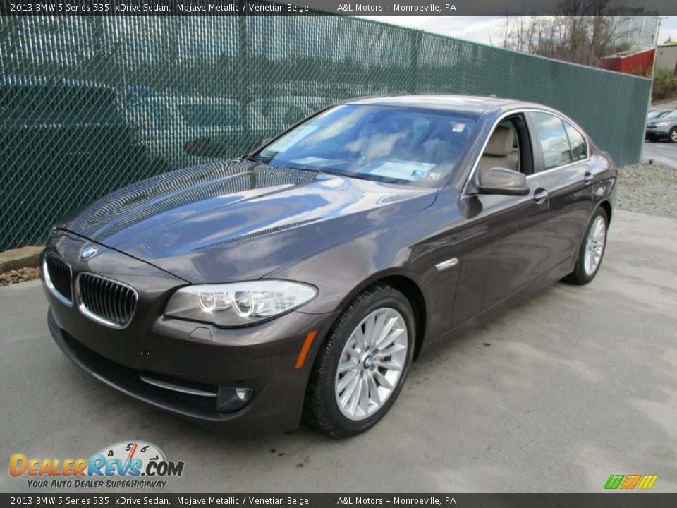 Front 3/4 View of 2013 BMW 5 Series 535i xDrive Sedan Photo #9