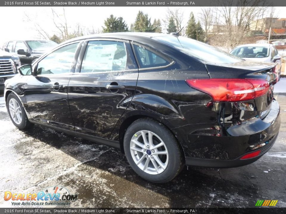 2016 Ford Focus SE Sedan Shadow Black / Medium Light Stone Photo #3