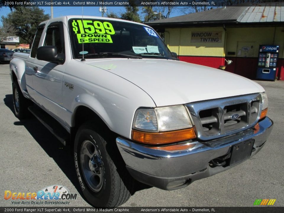 Front 3/4 View of 2000 Ford Ranger XLT SuperCab 4x4 Photo #1