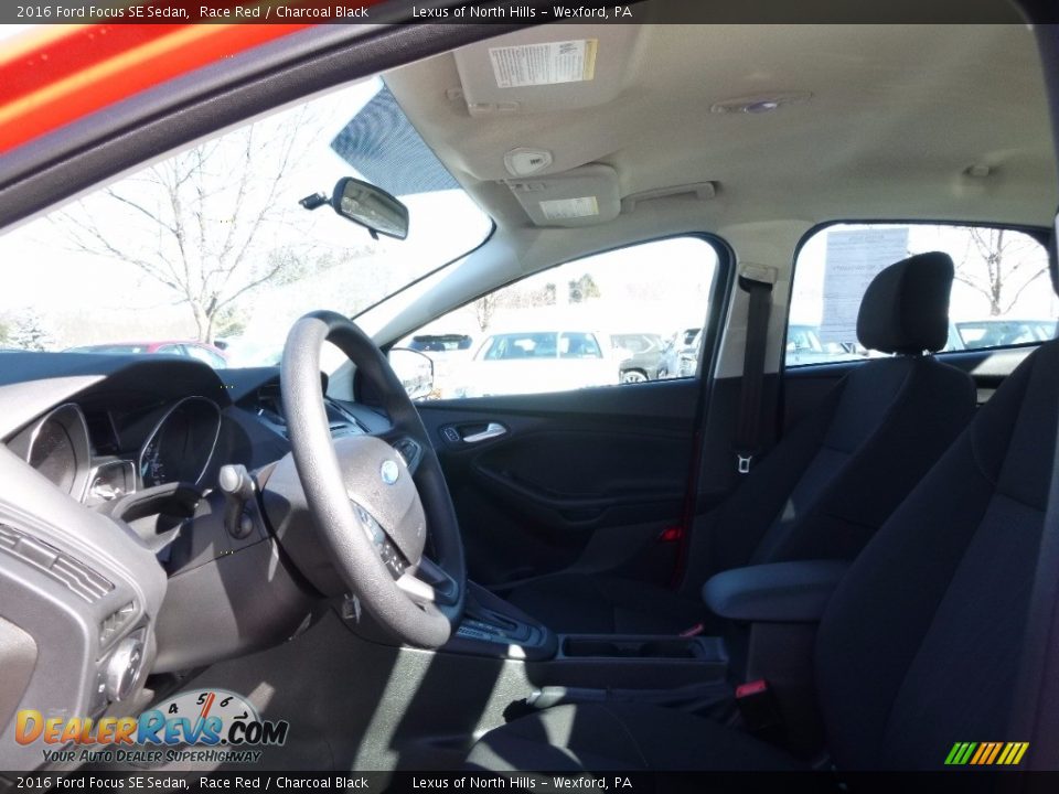 2016 Ford Focus SE Sedan Race Red / Charcoal Black Photo #8