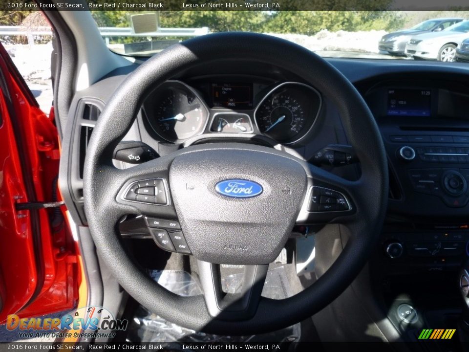 2016 Ford Focus SE Sedan Race Red / Charcoal Black Photo #14