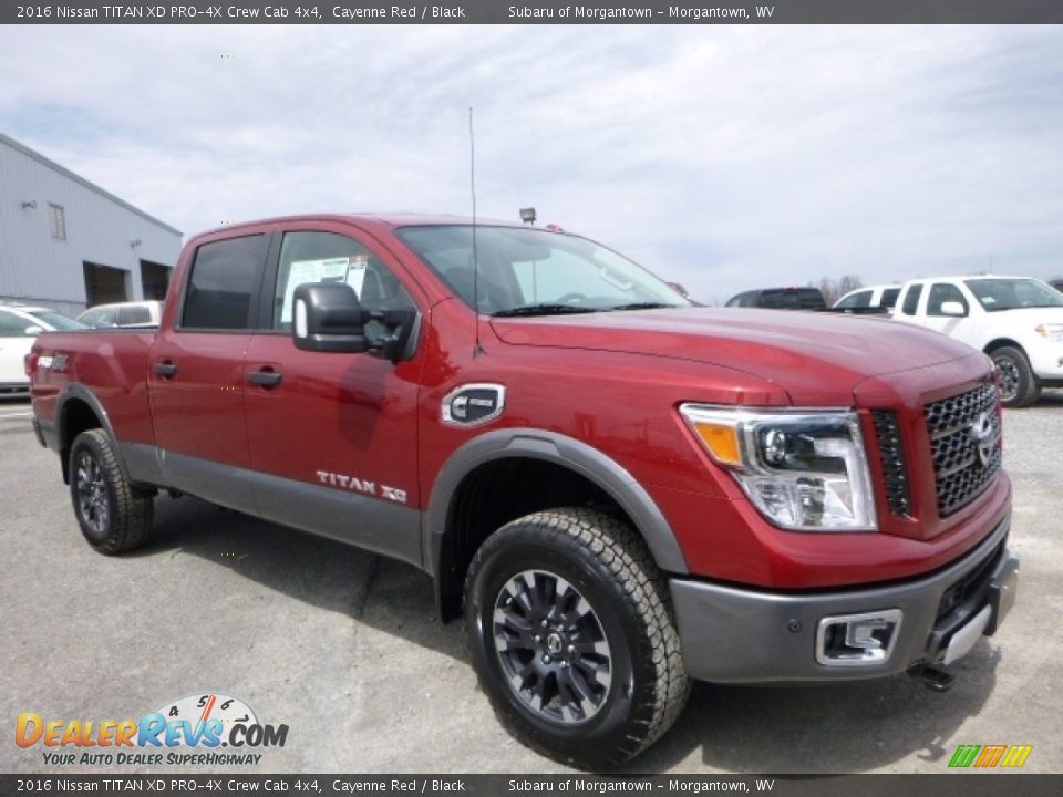 Front 3/4 View of 2016 Nissan TITAN XD PRO-4X Crew Cab 4x4 Photo #1