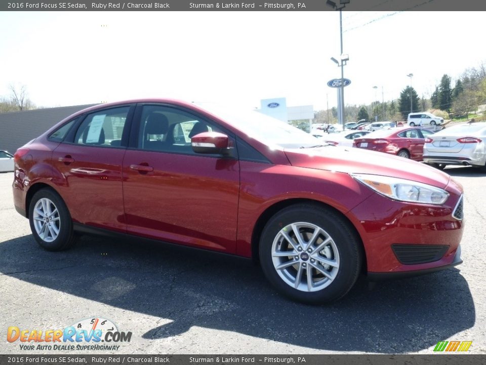 2016 Ford Focus SE Sedan Ruby Red / Charcoal Black Photo #1