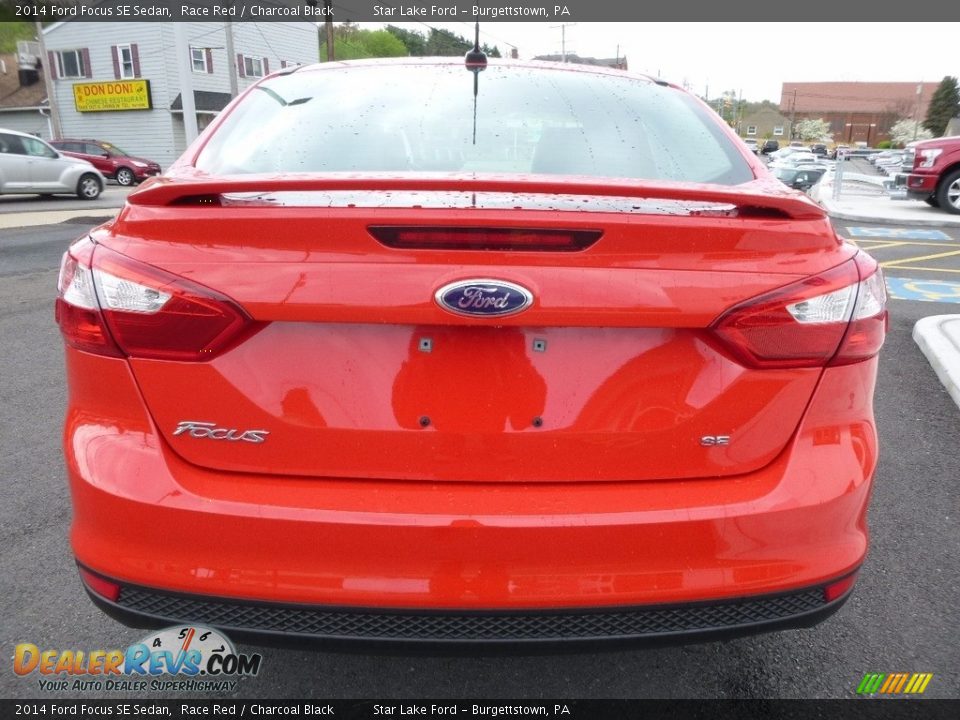 2014 Ford Focus SE Sedan Race Red / Charcoal Black Photo #7