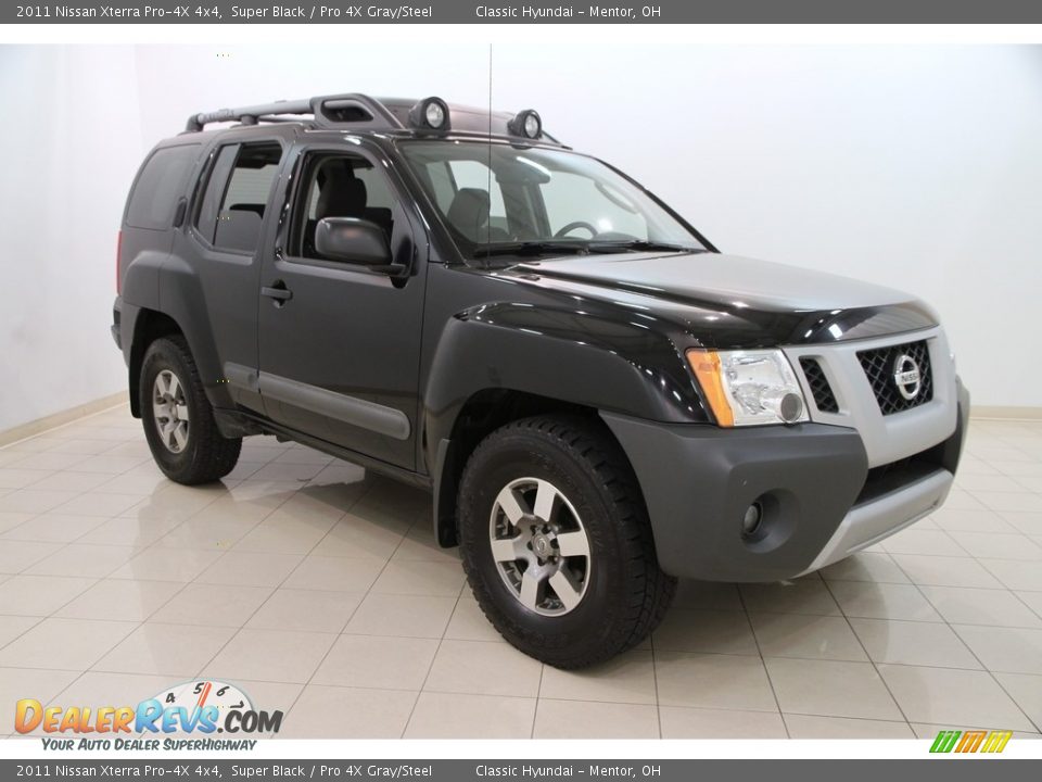 2011 Nissan Xterra Pro-4X 4x4 Super Black / Pro 4X Gray/Steel Photo #1