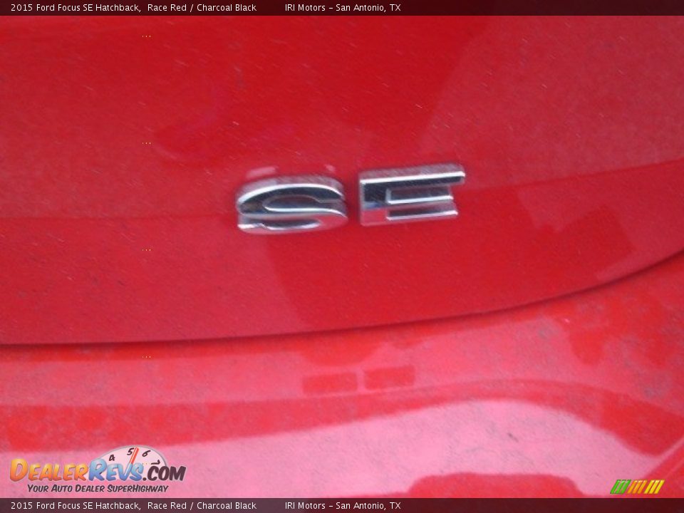 2015 Ford Focus SE Hatchback Race Red / Charcoal Black Photo #5