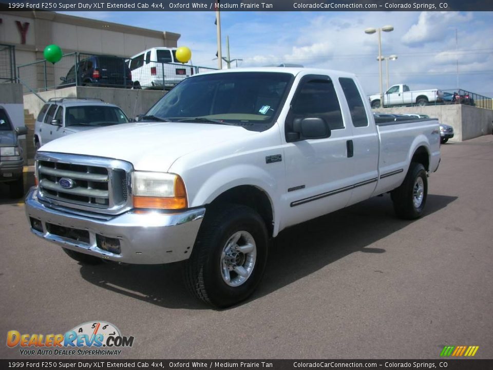 1999 Ford F250 Super Duty XLT Extended Cab 4x4 Oxford White / Medium Prairie Tan Photo #2