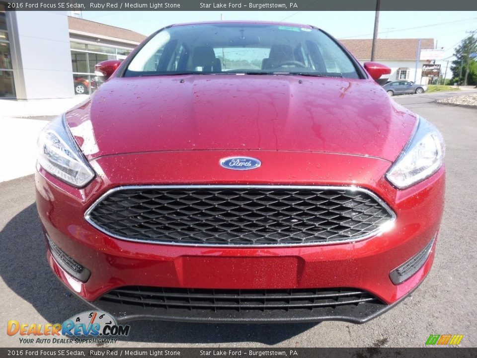 2016 Ford Focus SE Sedan Ruby Red / Medium Light Stone Photo #2