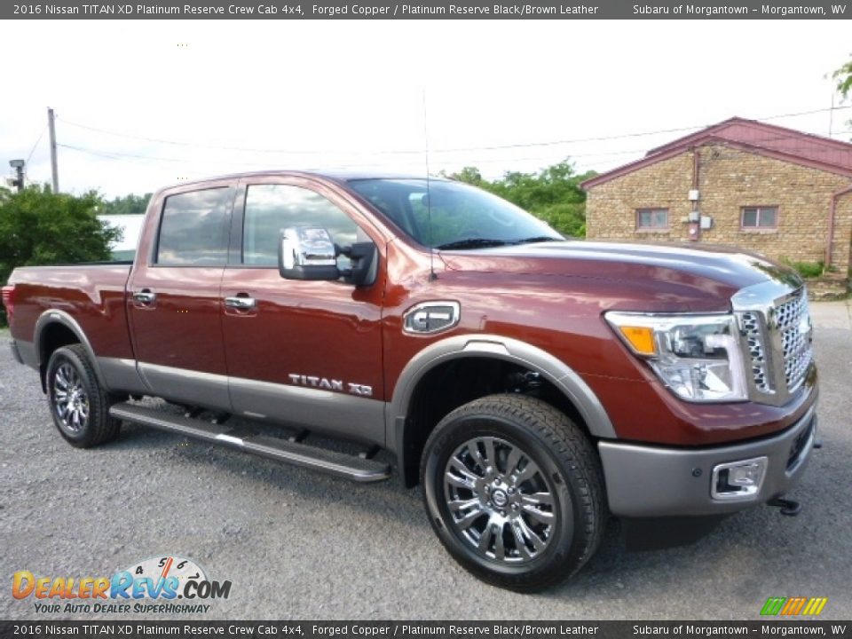 Front 3/4 View of 2016 Nissan TITAN XD Platinum Reserve Crew Cab 4x4 Photo #1