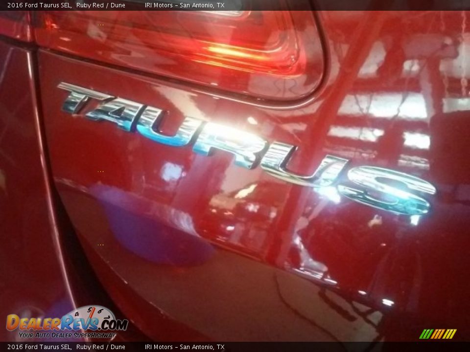 2016 Ford Taurus SEL Ruby Red / Dune Photo #10