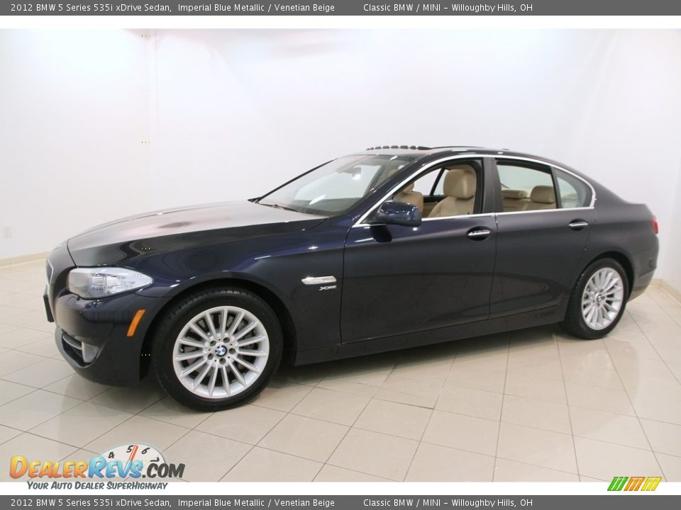 Front 3/4 View of 2012 BMW 5 Series 535i xDrive Sedan Photo #3