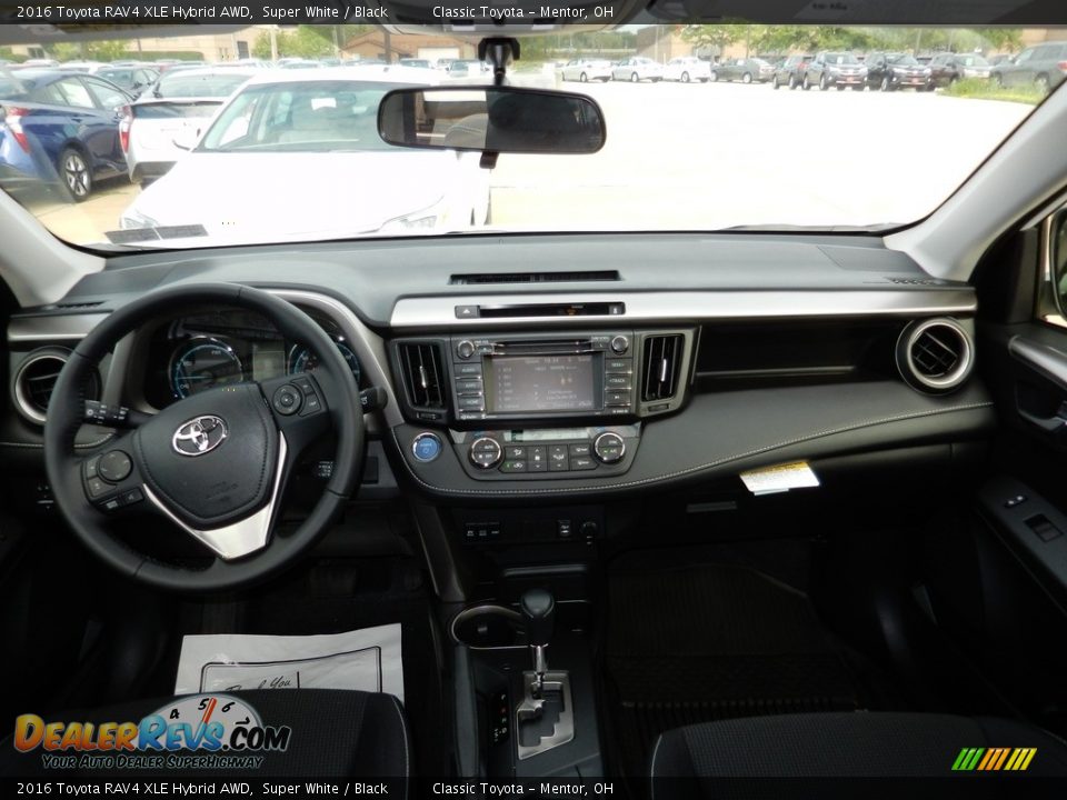 Dashboard of 2016 Toyota RAV4 XLE Hybrid AWD Photo #5