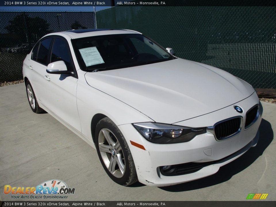 Front 3/4 View of 2014 BMW 3 Series 320i xDrive Sedan Photo #5