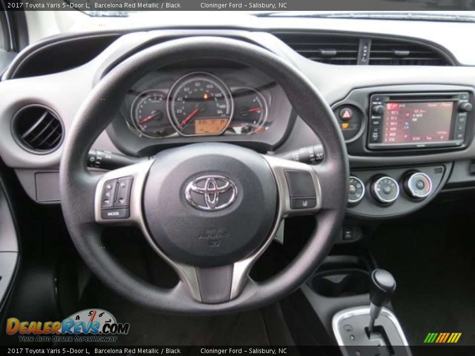 Dashboard of 2017 Toyota Yaris 5-Door L Photo #5